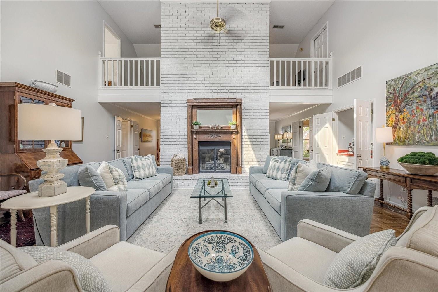 1893 Allenby Road Germantown, TN 38139 - Photo 1 of 31 a living room with furniture a fireplace and a flat screen tv