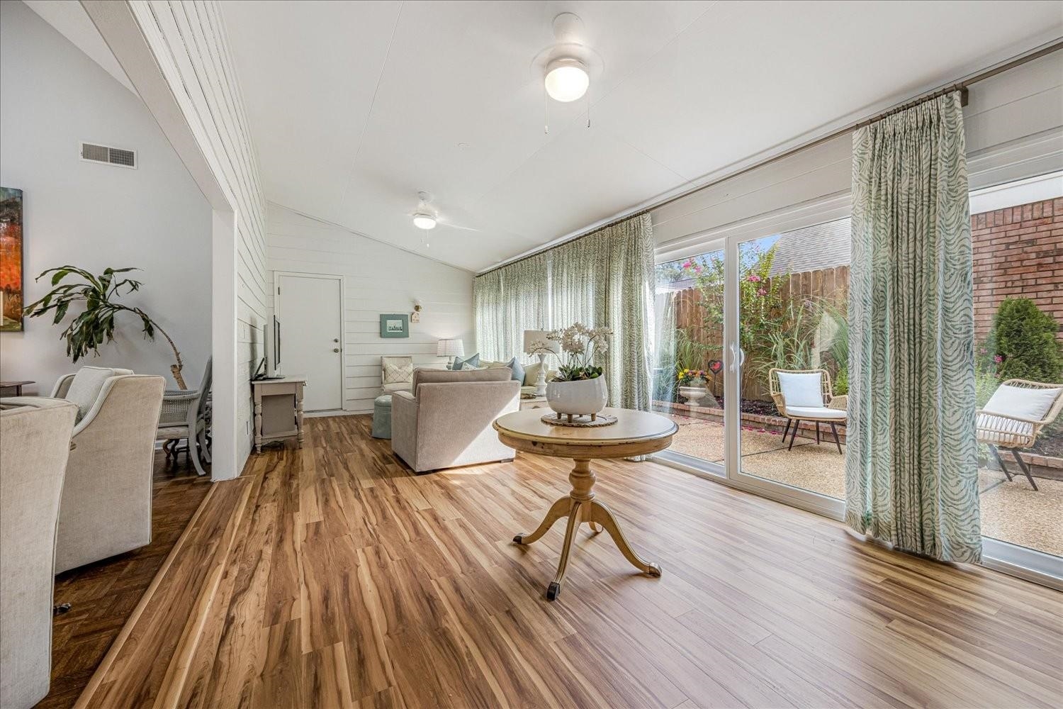 1893 Allenby Road Germantown, TN 38139 - Photo 11 of 31 a living room with furniture and a wooden floor