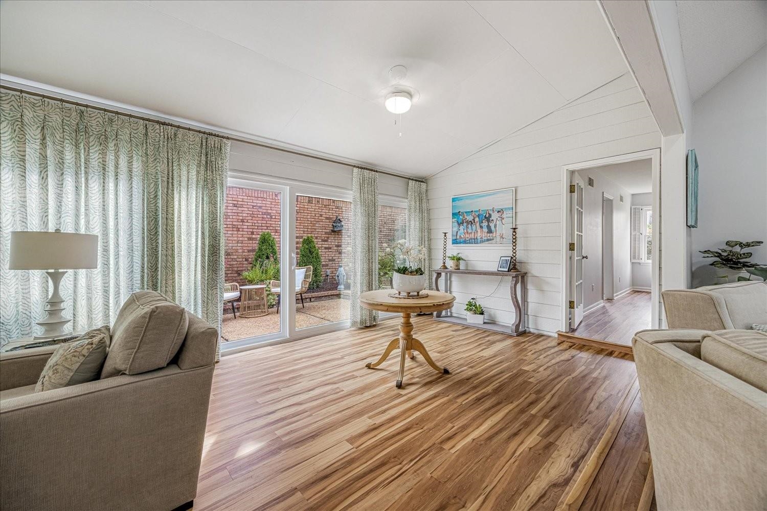 1893 Allenby Road Germantown, TN 38139 - Photo 12 of 31 a living room with furniture and a large window