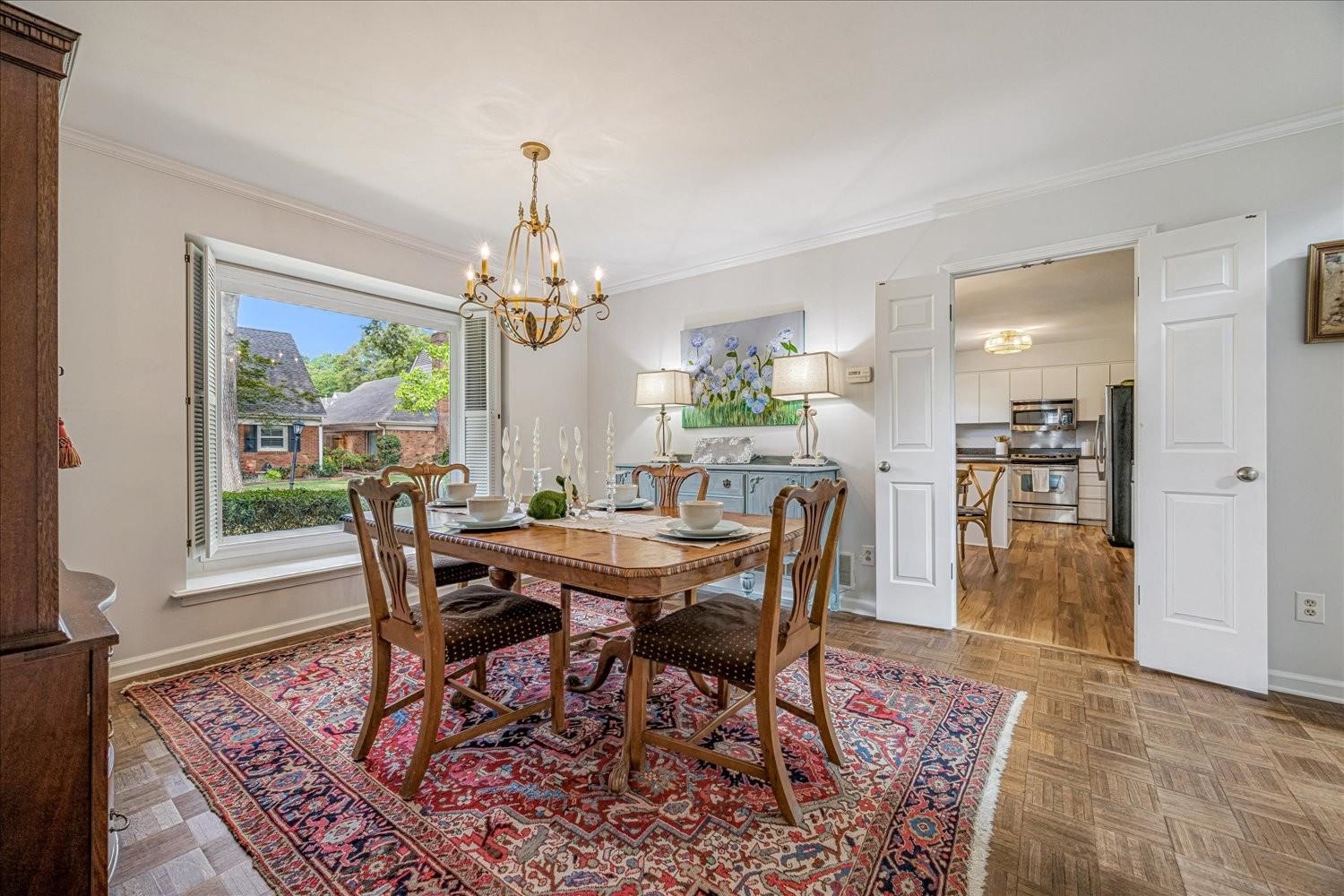 1893 Allenby Road Germantown, TN 38139 - Photo 13 of 31 a view of a dining room with furniture window and wooden floor