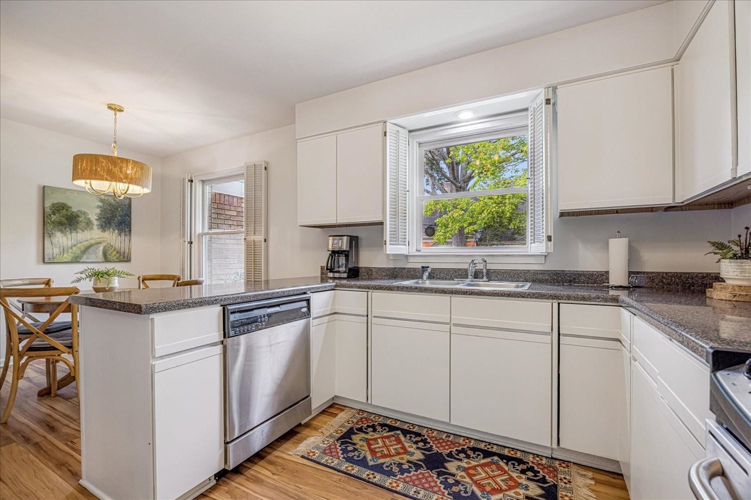 1893 Allenby Road Germantown, TN 38139 - Photo 15 of 31 a kitchen with sink cabinets and window