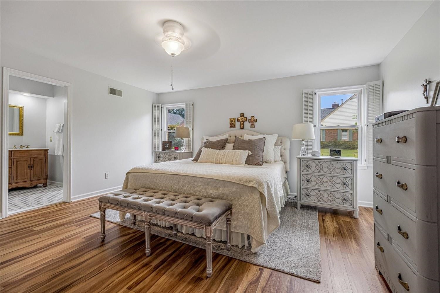 1893 Allenby Road Germantown, TN 38139 - Photo 20 of 31 a bedroom with a bed and a table in it