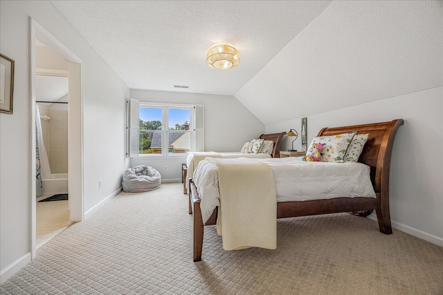 1893 Allenby Road Germantown, TN 38139 - Photo 26 of 31 a bedroom with bed and a window