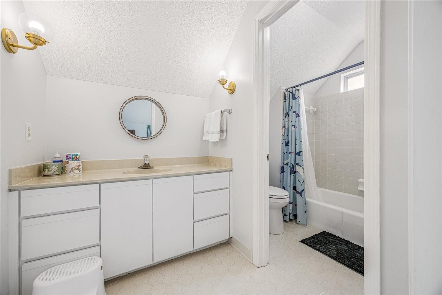 1893 Allenby Road Germantown, TN 38139 - Photo 27 of 31 a bathroom with a double vanity sink a toilet and shower