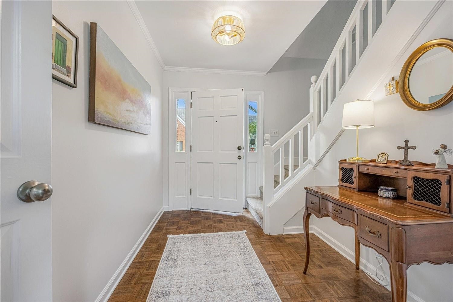 1893 Allenby Road Germantown, TN 38139 - Photo 6 of 31 a view of a hallway to a livingroom with furniture