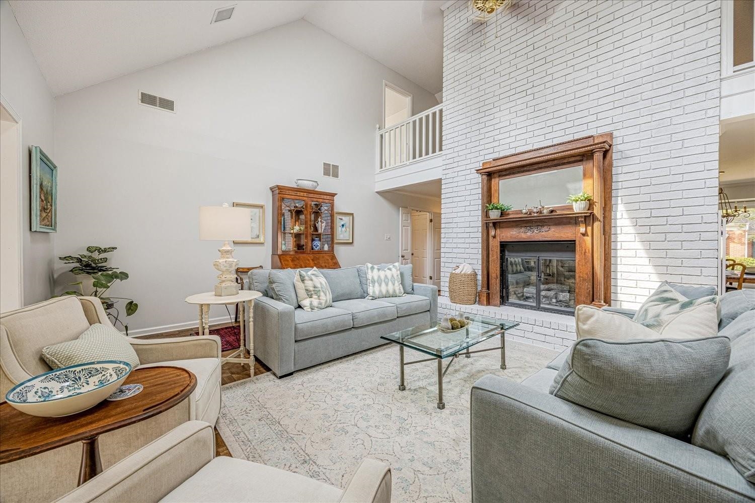 1893 Allenby Road Germantown, TN 38139 - Photo 10 of 31 a living room with furniture and a fireplace