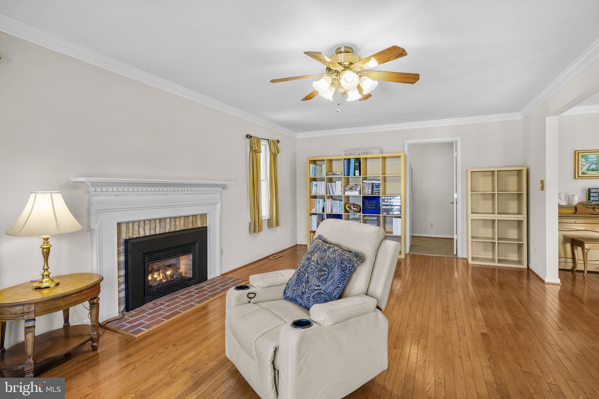 939 Main Street Deale, MD 20751 - Photo 12 of 37 a living room with furniture and a fireplace