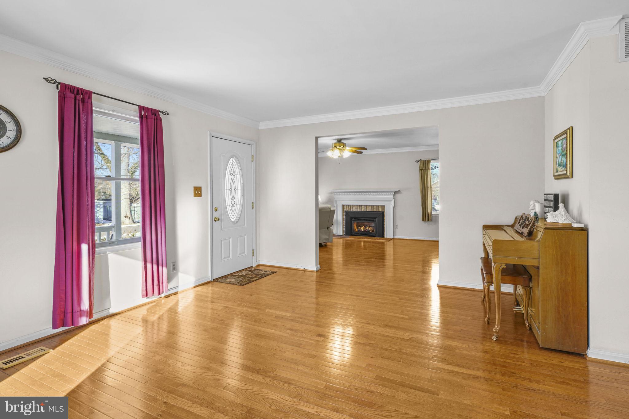 939 Main Street Deale, MD 20751 - Photo 16 of 37 a living room with furniture and a fireplace