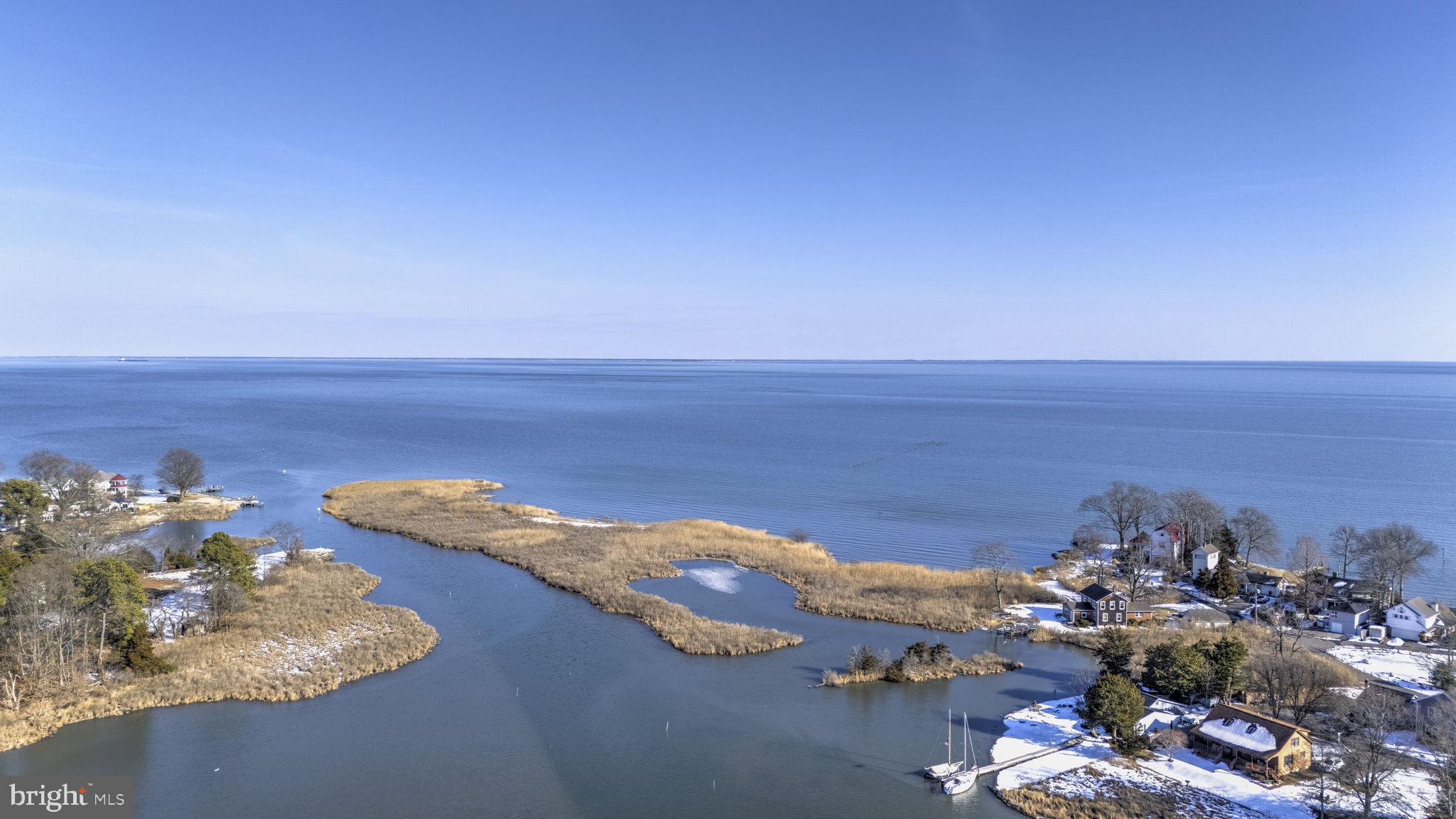 939 Main Street Deale, MD 20751 - Photo 2 of 37 a view of a sky from a floor to ceiling window