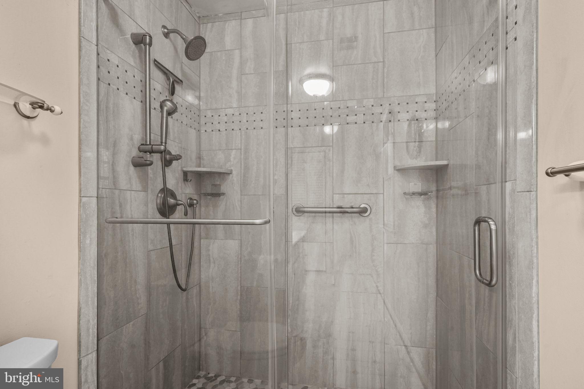 939 Main Street Deale, MD 20751 - Photo 23 of 33 a bathroom with a shower