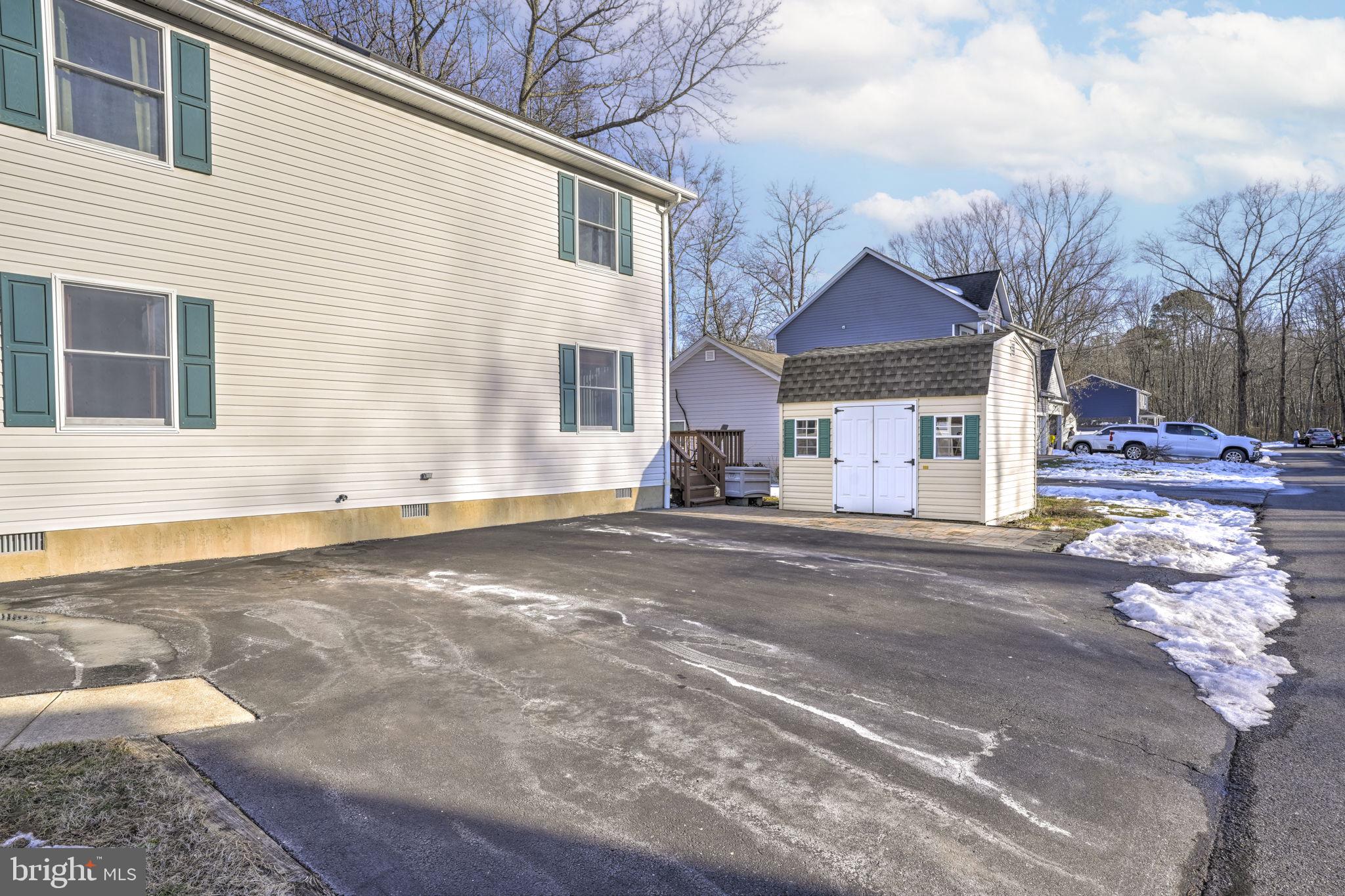 939 Main Street Deale, MD 20751 - Photo 29 of 33 a view of a house with a snow on the road