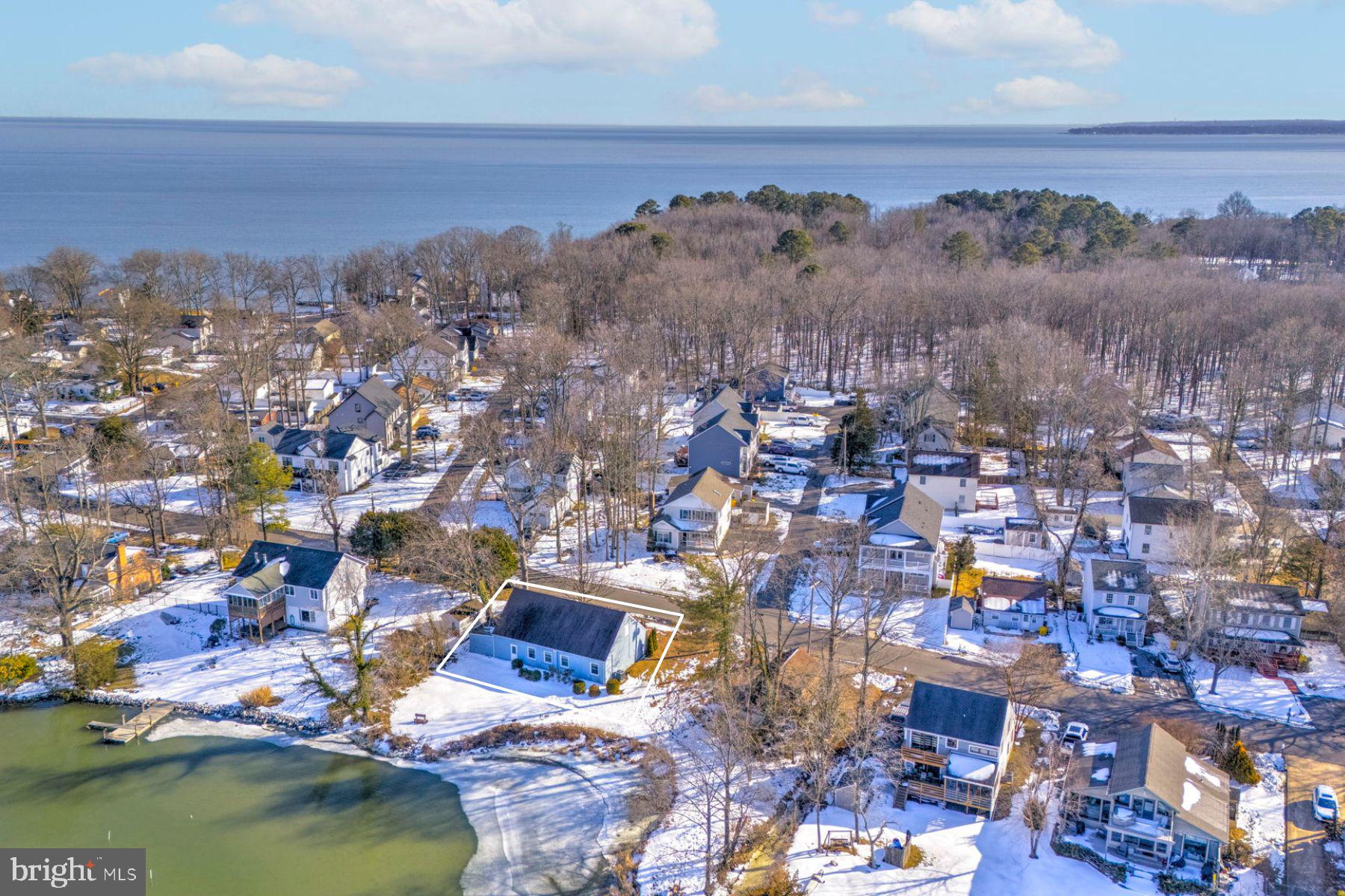 939 Main Street Deale, MD 20751 - Photo 37 of 37 an aerial view of residential houses with outdoor space and trees
