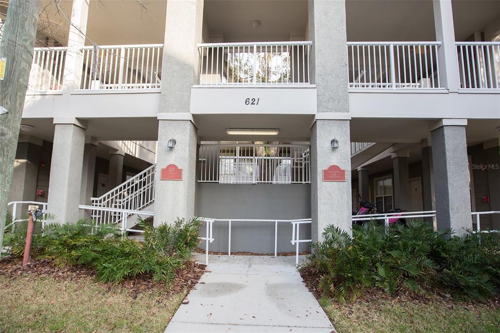 621 Southwest 10th Street, Unit 108 Gainesville, FL 32601 - Photo 1 of 1 a front view of a house with plants