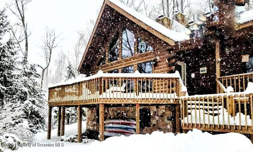 9 East Lake Road Moscow, PA 18444 - Photo 48 of 48 a view of a house with wooden deck