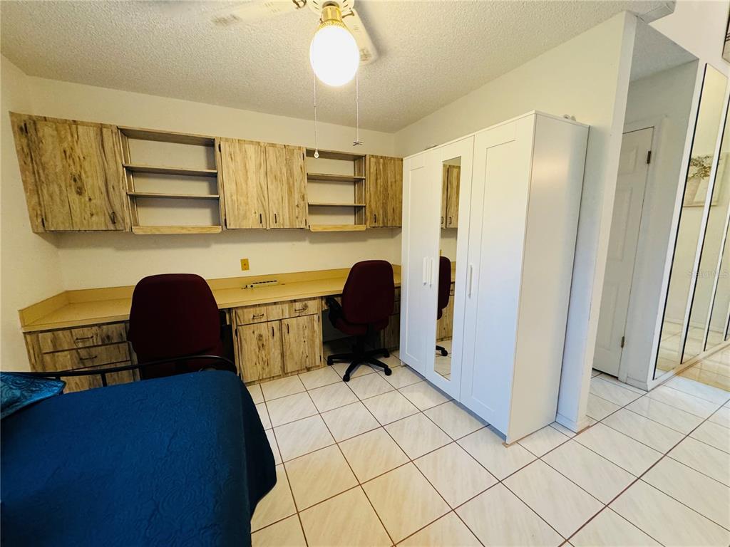 7559 Heather Walk Drive Weeki Wachee, FL 34613 - Photo 11 of 26 a view of kitchen with stainless steel appliances granite countertop cabinets and sink