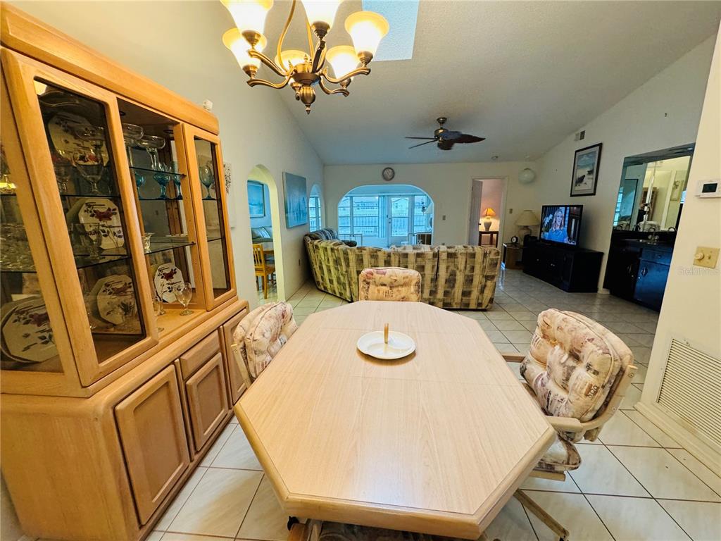 7559 Heather Walk Drive Weeki Wachee, FL 34613 - Photo 7 of 26 a view of a dining room with furniture