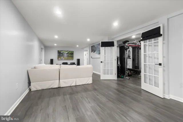 a view of a patio with table and chairs potted plants with wooden floor