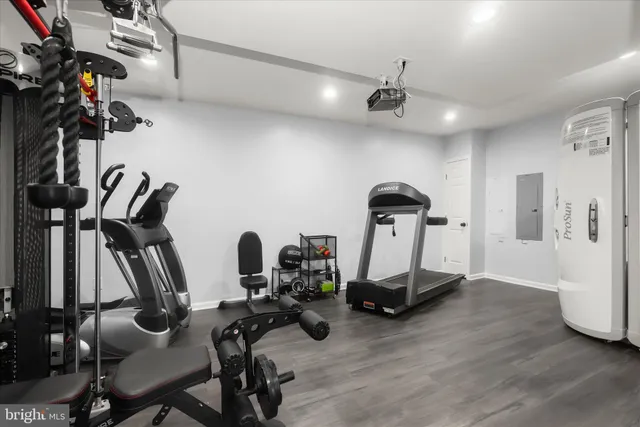 a bathroom with a bathtub and a window