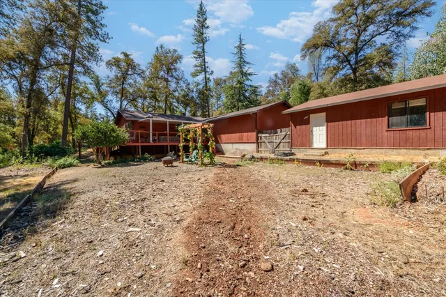 a backyard of a house with lots of green space