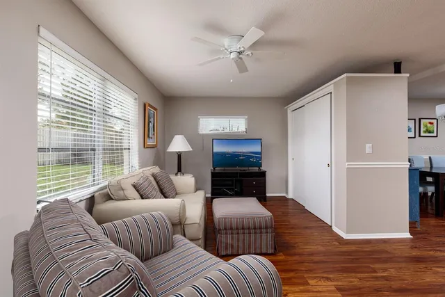a living room with furniture and a window