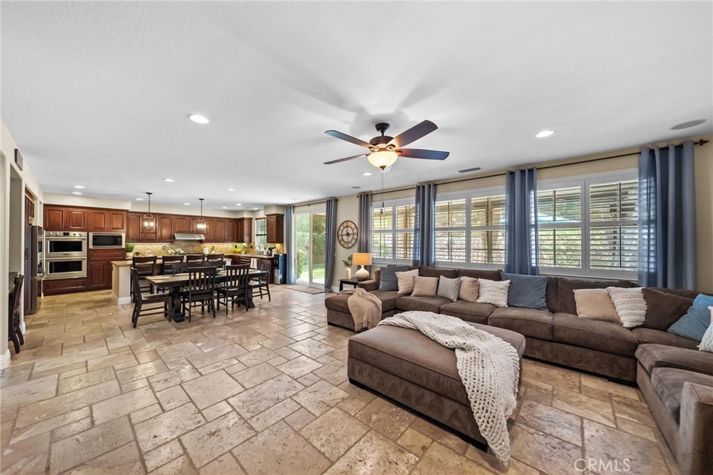 46331 Hunter Trail Temecula, CA 92592 - Photo 16 of 62 a living room with furniture and a large window