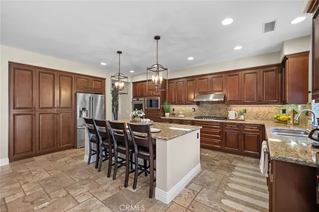 a bedroom with a bed and a cabinets