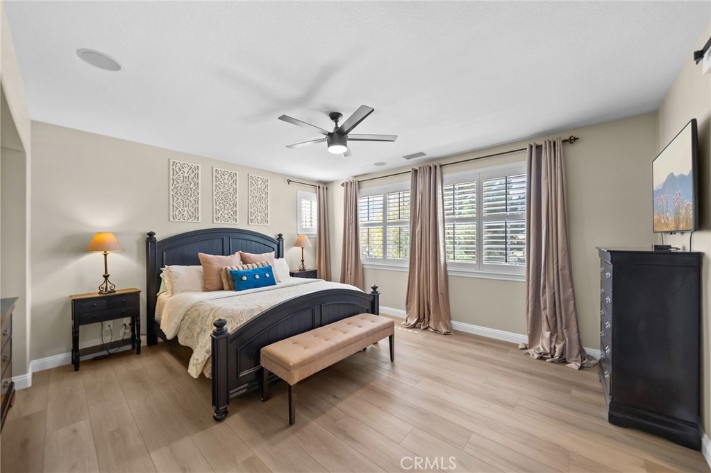 46331 Hunter Trail Temecula, CA 92592 - Photo 35 of 62 a bedroom with a bed a window and a television