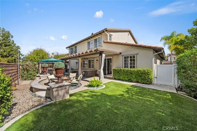 an aerial view of residential house with outdoor space and river