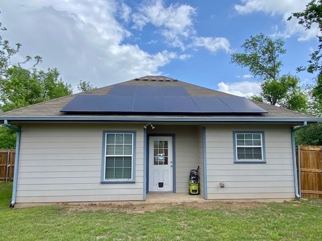 1008 North 14th Street Waco, TX 76707 - Photo 28 of 35 Rear elevation with roof solar panels