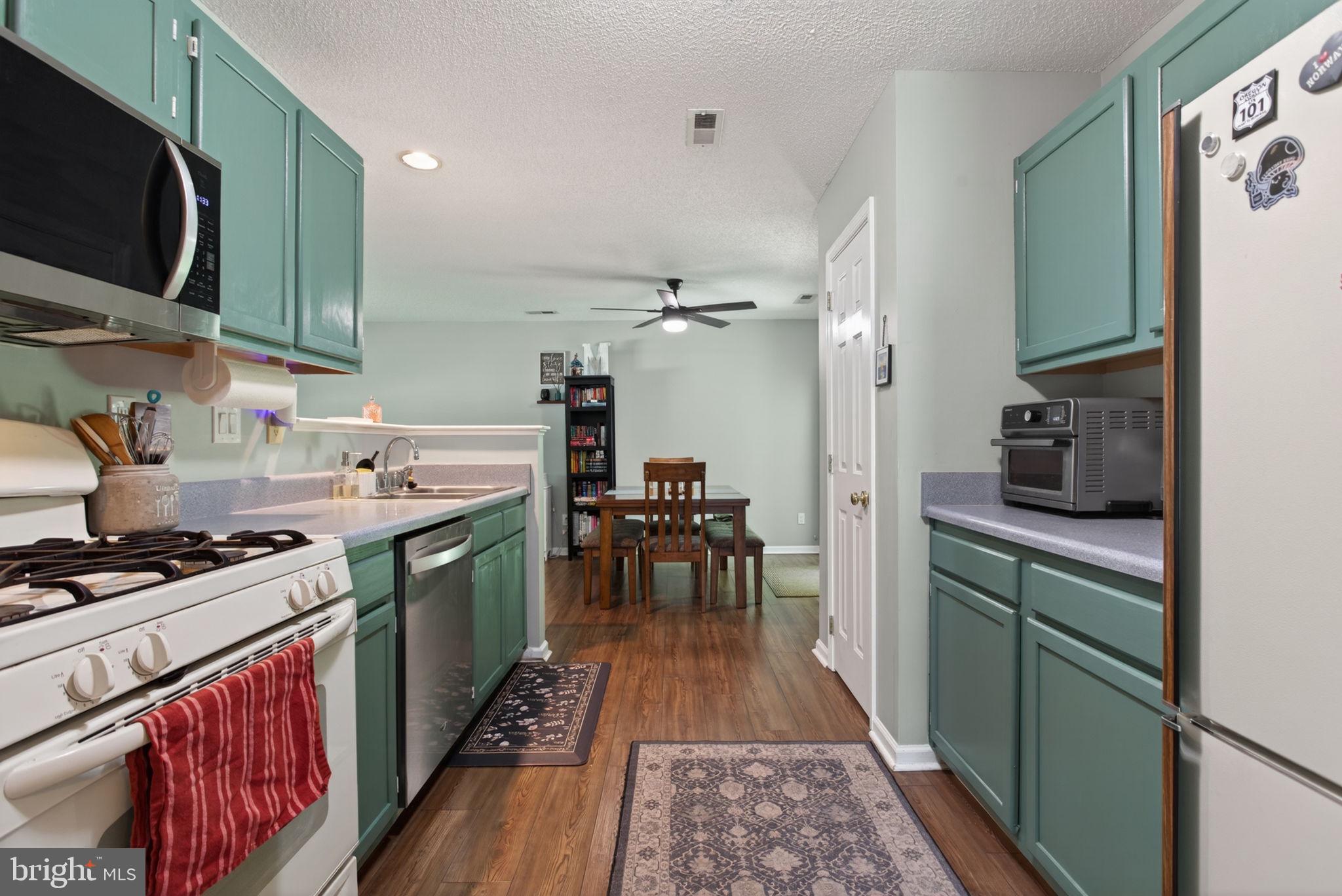3917 Longhill Station Road Williamsburg, VA 23188 - Photo 13 of 29 Charming kitchen with modern touches.