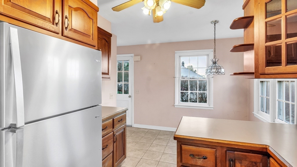 2022 Calkins Road Palmer, MA 01069 - Photo 12 of 38 a room with window and chandelier