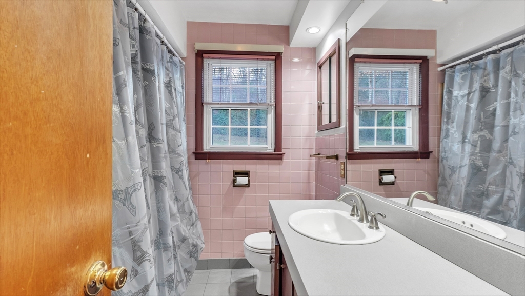 2022 Calkins Road Palmer, MA 01069 - Photo 29 of 38 a bathroom with a sink toilet and shower