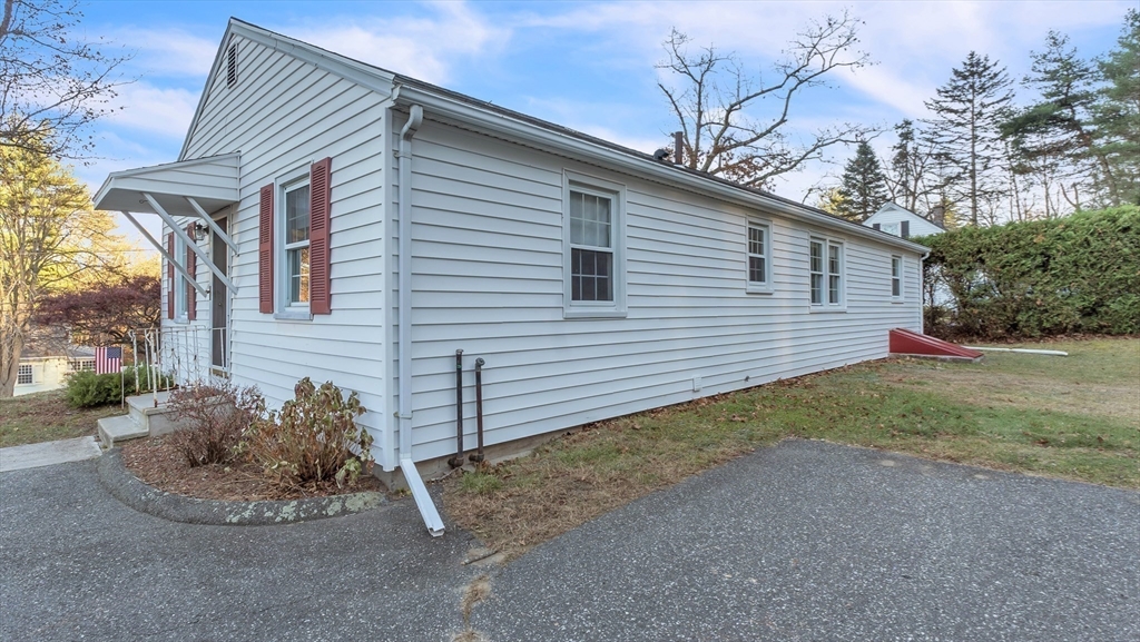 2022 Calkins Road Palmer, MA 01069 - Photo 35 of 38 a view of a house with a yard