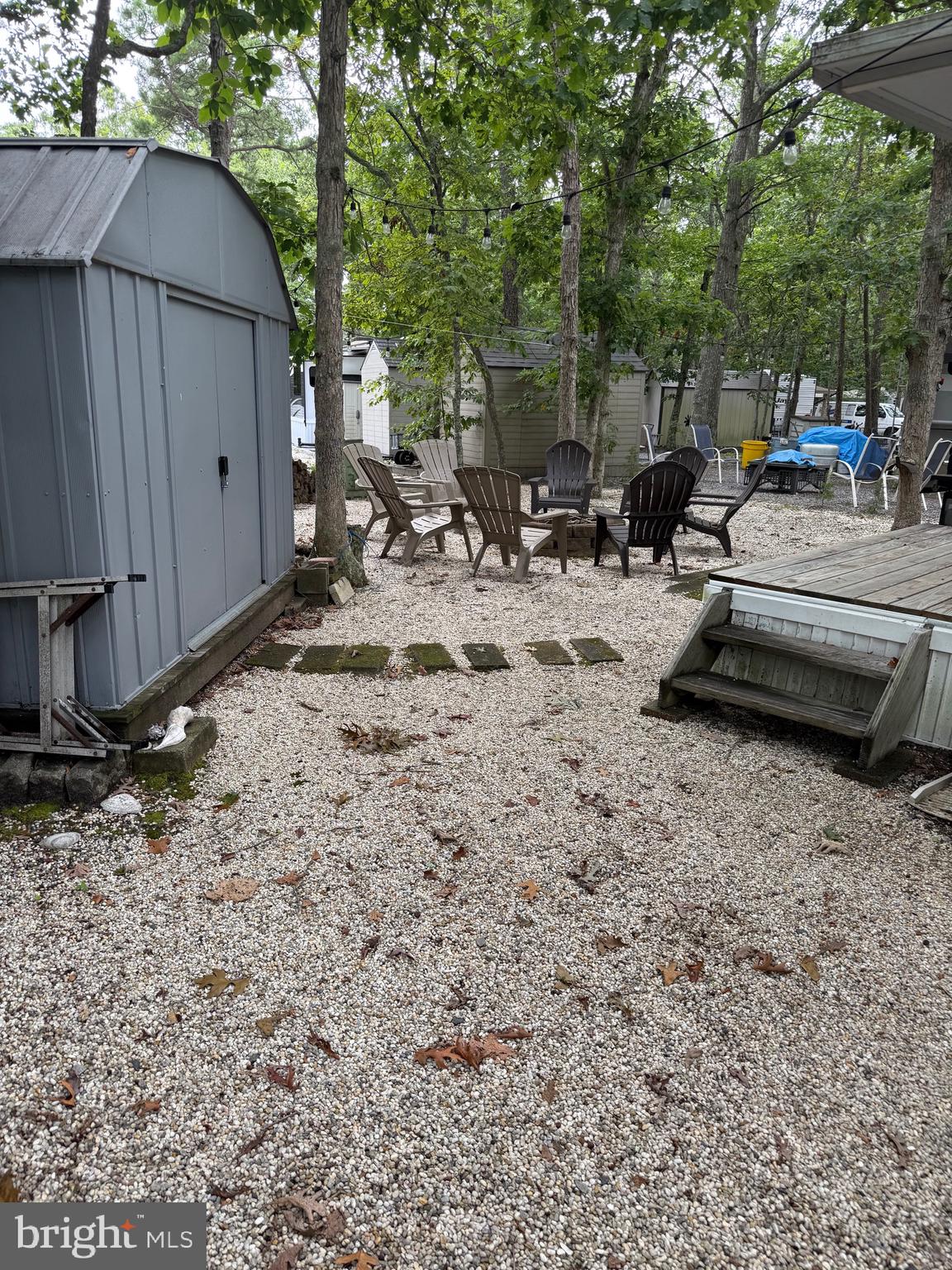 3066 Highway 9, Unit 246 Ocean View, NJ 08230 - Photo 8 of 8 a view of a backyard with sitting area