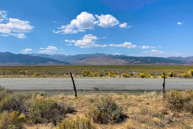 a view of a lake with a mountain in the background