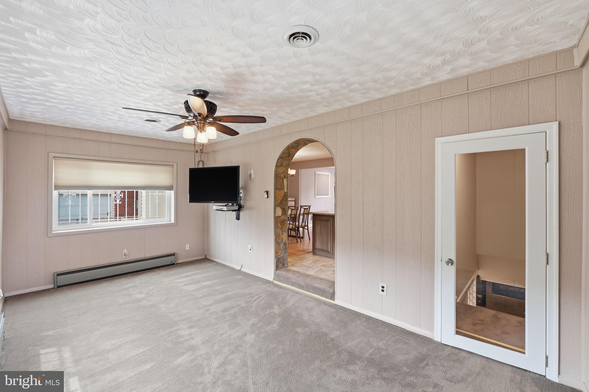 10713 Gregory Street Silver Spring, MD 20901 - Photo 13 of 38 Step down to a delightful Sunroom from Kitchen