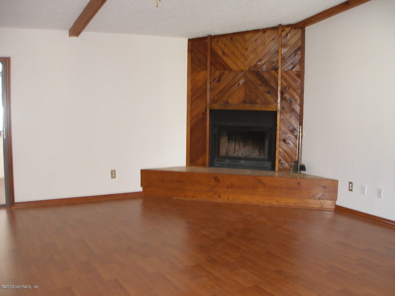 213 Gentian Road St. Augustine, FL 32086 - Photo 2 of 11 a view of empty room with a fireplace