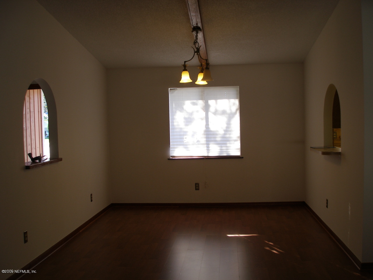 213 Gentian Road St. Augustine, FL 32086 - Photo 5 of 11 an empty room with a window