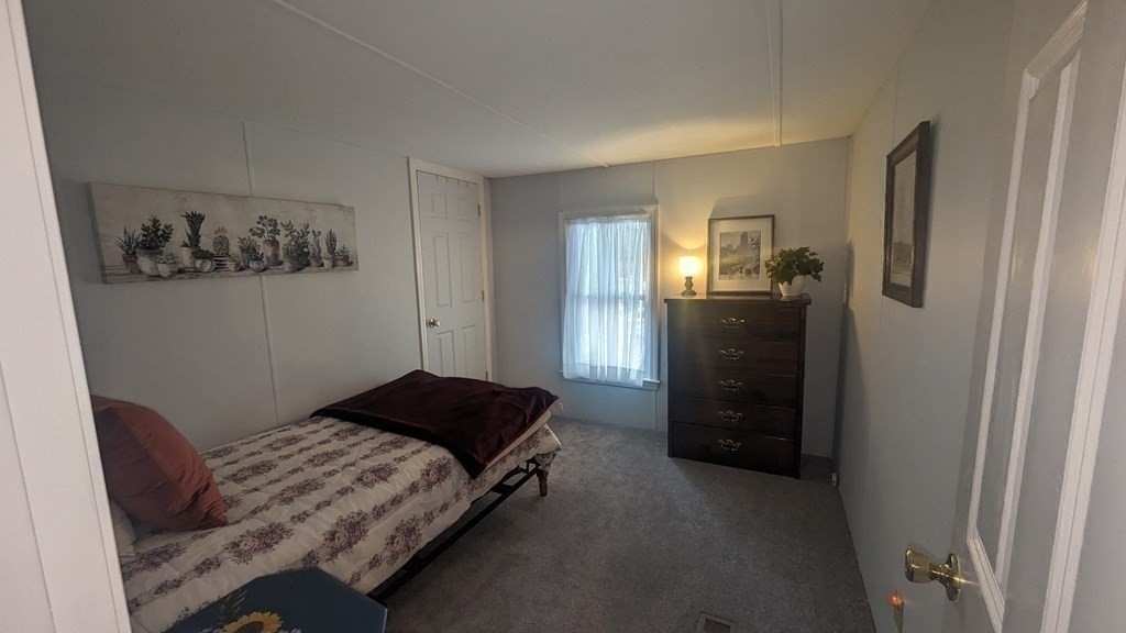 41 Victorian Way West Bridgewater, MA 02379 - Photo 11 of 16 a bedroom with a bed and a window