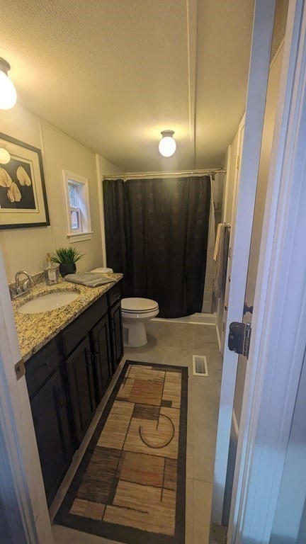 41 Victorian Way West Bridgewater, MA 02379 - Photo 12 of 16 a bathroom with a sink and a mirror