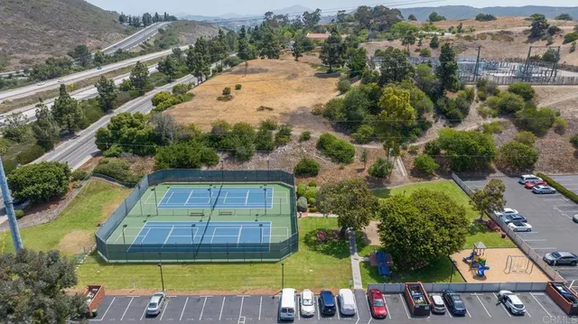 an aerial view of a house with a garden