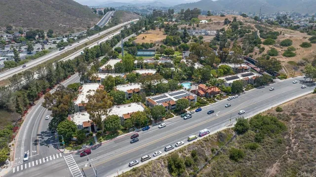 a city street with tall buildings
