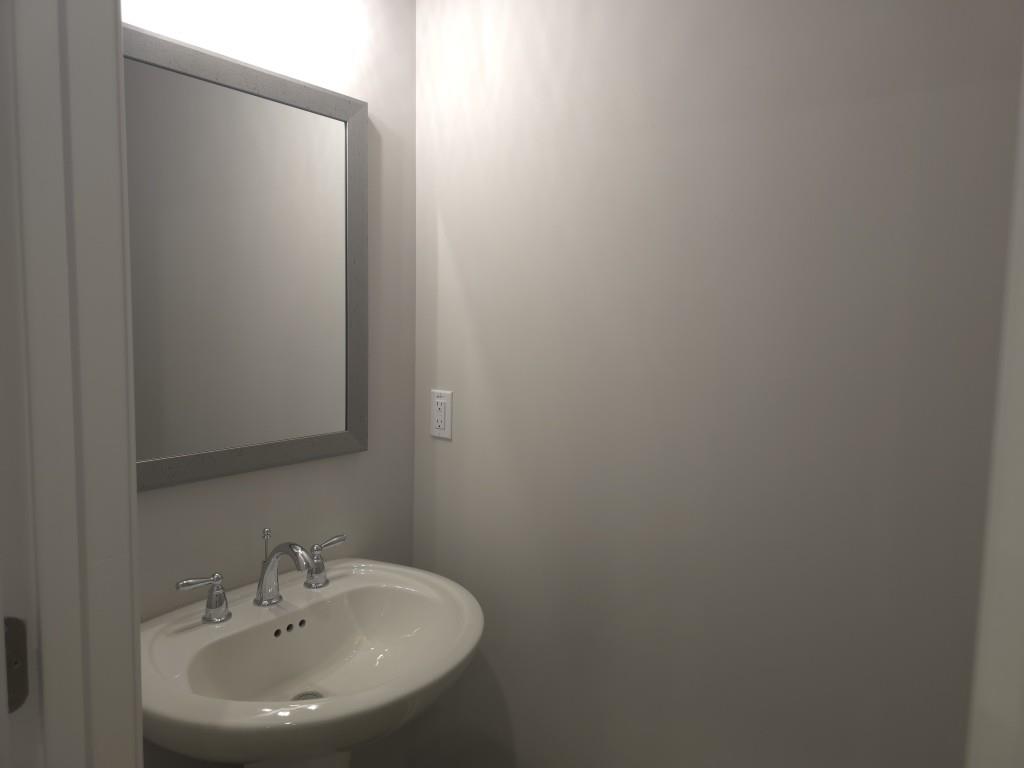 4240 Cavalier Way Duluth, GA 30097 - Photo 13 of 46 a bathroom with a sink and a mirror