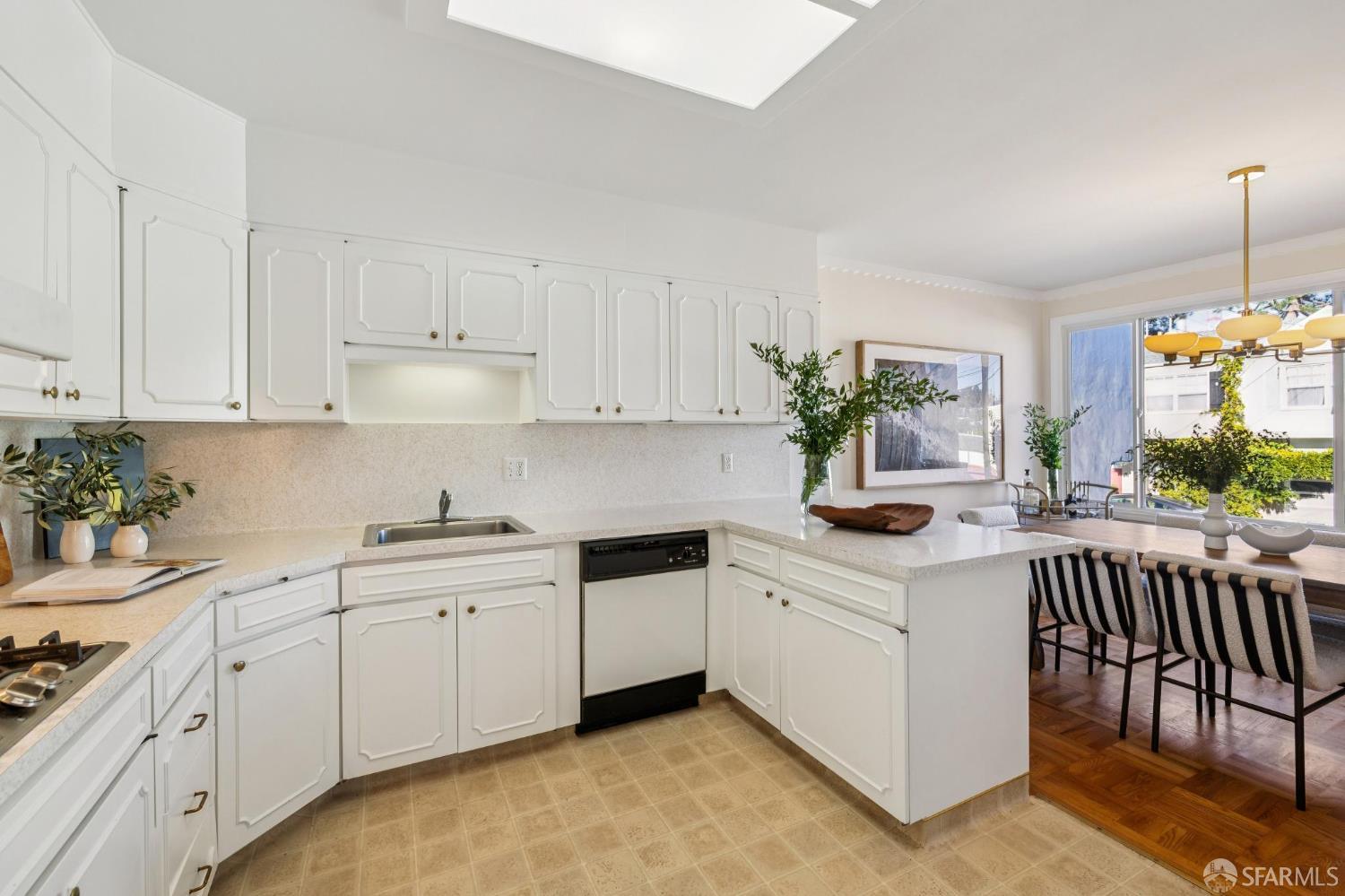 159 Stillings Avenue San Francisco, CA 94131 - Photo 5 of 21 a kitchen with a sink stove and cabinets