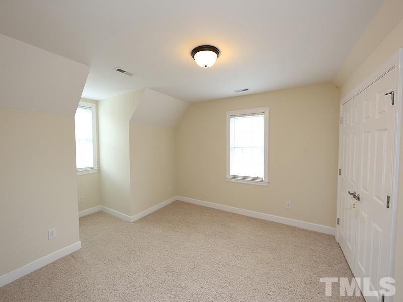 4689 Seven Paths Road Spring Hope, NC 27882 - Photo 8 of 12 a view of an empty room with a window