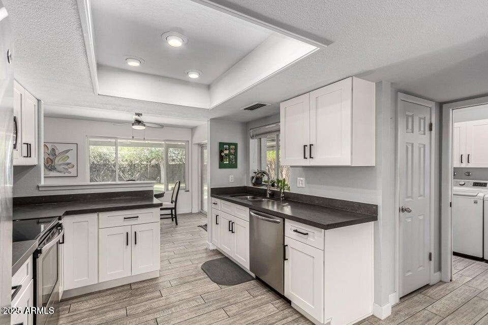 4909 East Waltann Lane Scottsdale, AZ 85254 - Photo 15 of 34 a kitchen with granite countertop a sink and cabinets