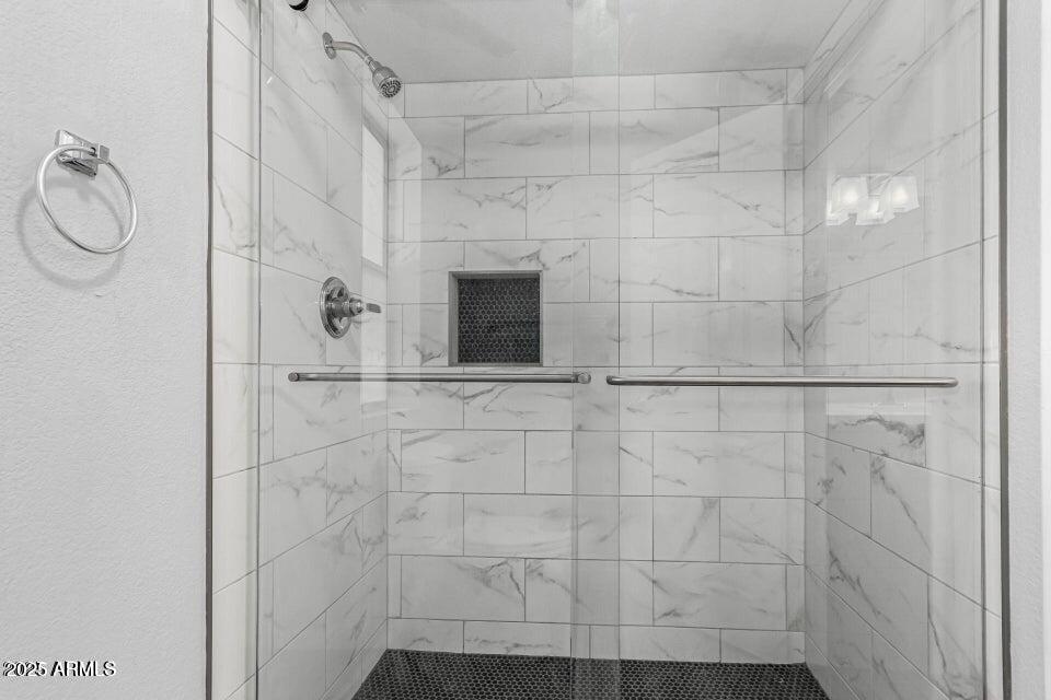 4909 East Waltann Lane Scottsdale, AZ 85254 - Photo 17 of 34 a bathroom with a shower