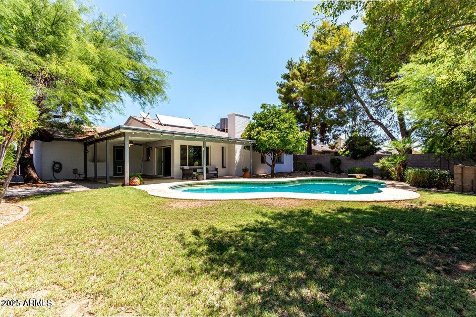 4909 East Waltann Lane Scottsdale, AZ 85254 - Photo 31 of 34 a view of house with outdoor space and swimming pool