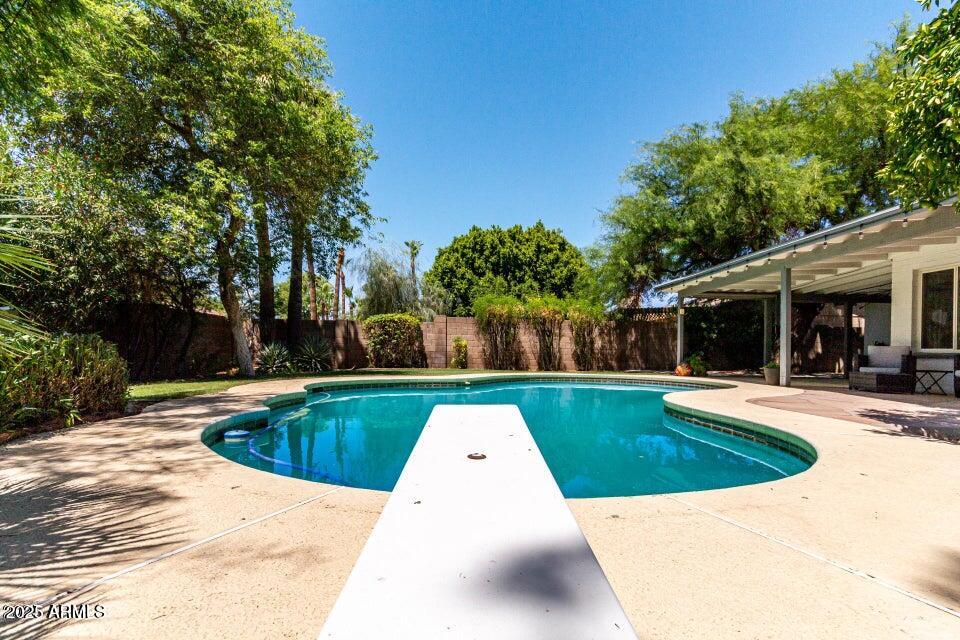 4909 East Waltann Lane Scottsdale, AZ 85254 - Photo 33 of 34 a view of swimming pool with seating space