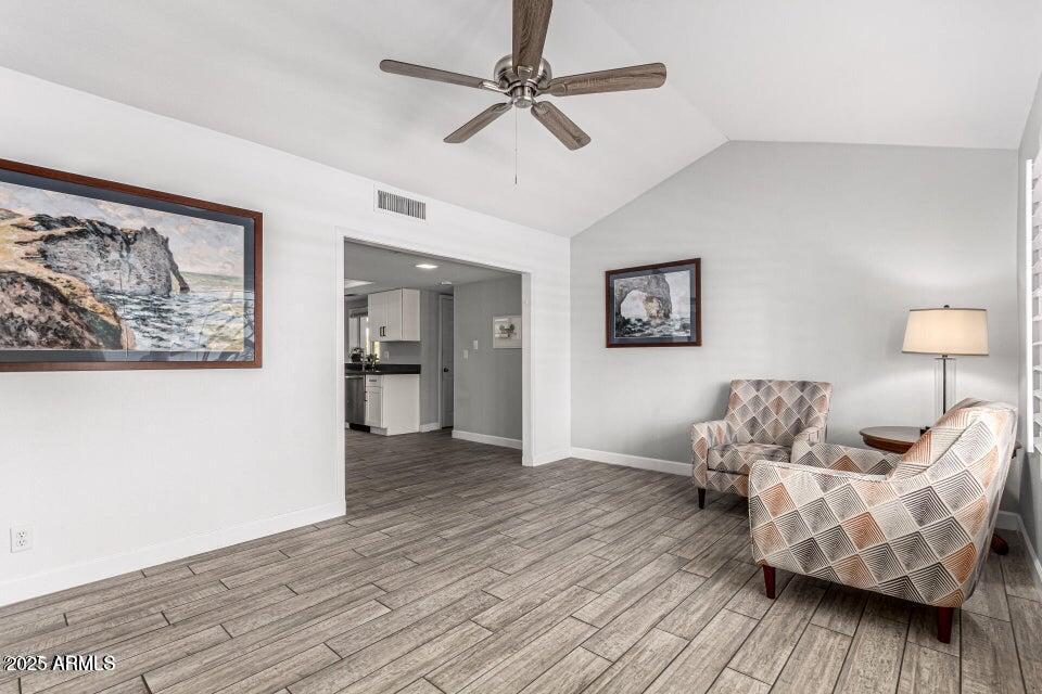 4909 East Waltann Lane Scottsdale, AZ 85254 - Photo 6 of 34 a living room with furniture and wooden floor